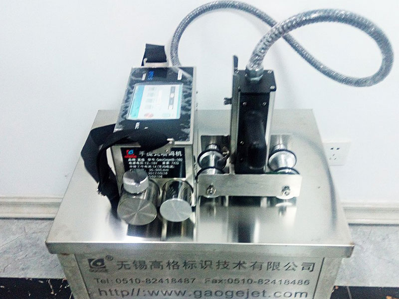 激光噴碼打標機